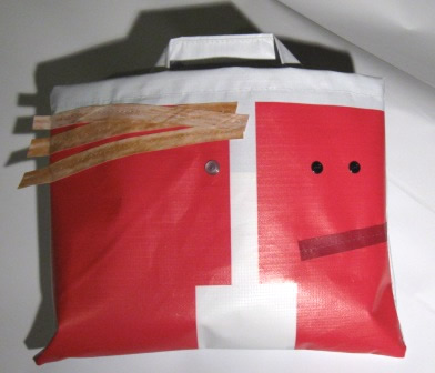 Tote bags made out of the left-over pieces of billboard canvas.
